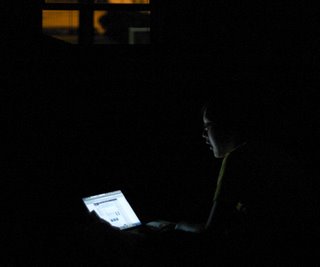 HALO member blogging on laptop