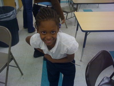 Elementary school girl posing for camera