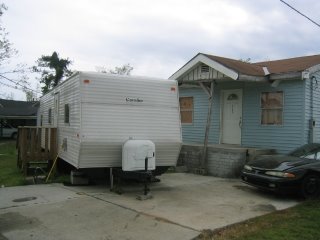 Trailer next to house