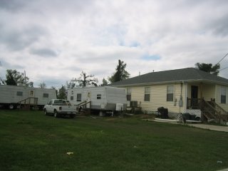Trailers next to house