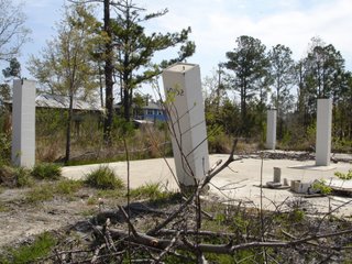 Foundation and supporting pillars of destroyed building