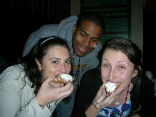 HALO members eating beignets